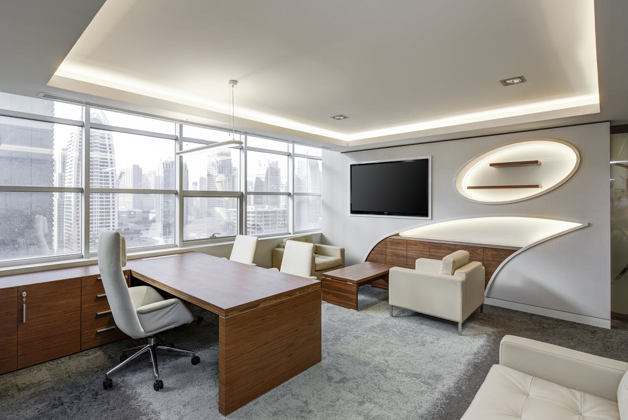 cta-02 Sleek office space featuring contemporary furniture and city skyline views, ideal for professionals.